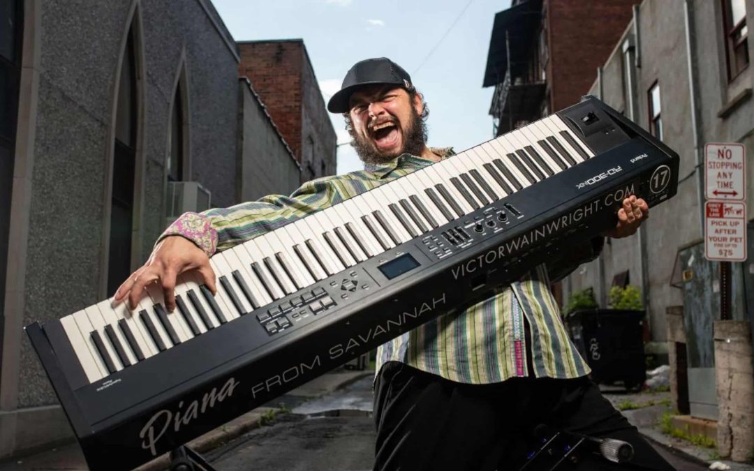 man playing the keyboard